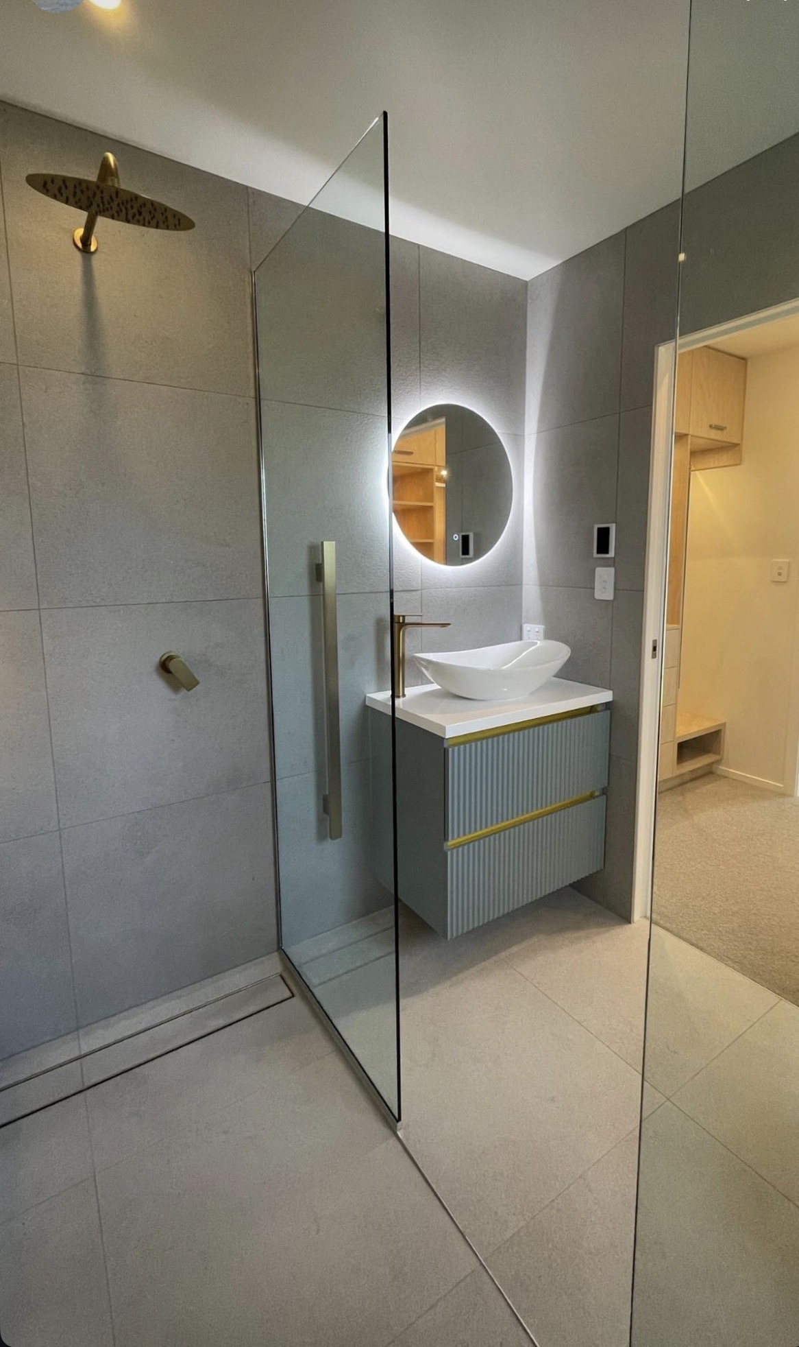 Bathroom electrical fit out with backlit mirror and downlights by Boyd Electrical Whanganui